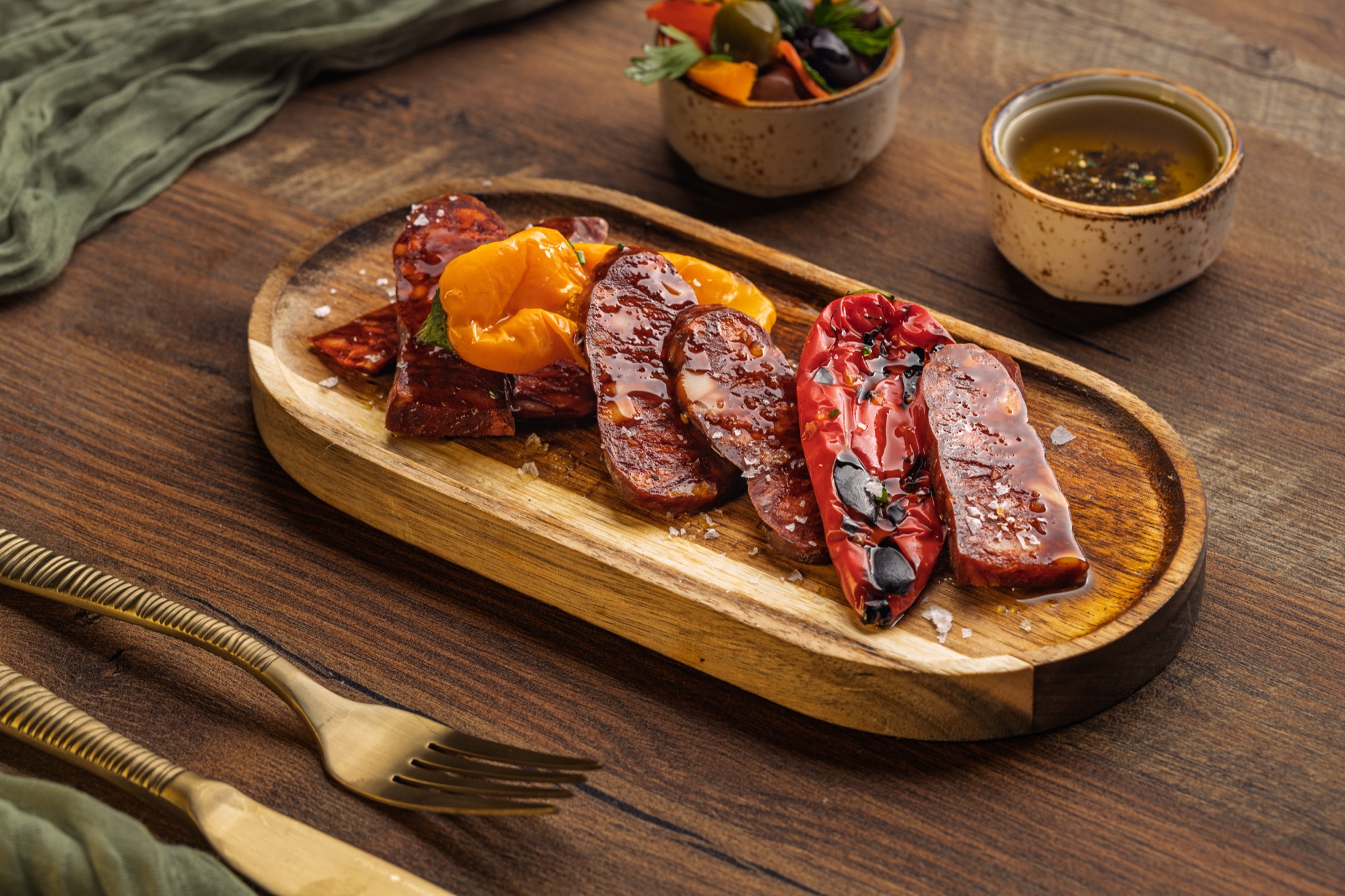 Chorizo with grilled peppers and olives