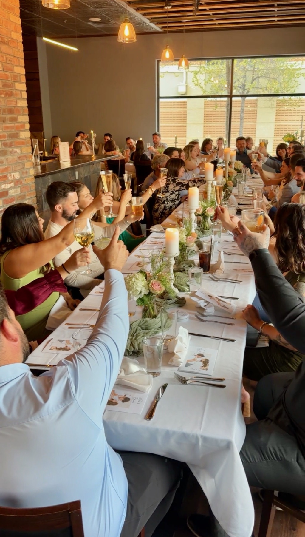 A candlelit private event table at Falcon & Fig
